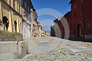 Cobbled street in the Saluzzo old town area. Piemonte, Italy