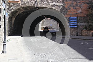 Cobbled street under the large vehicular tunnel in the city of Guanajuato Mexico, capital of the state