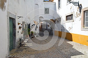 Cobbled streets in Faro city historical center, Algarve, Southern Portugal