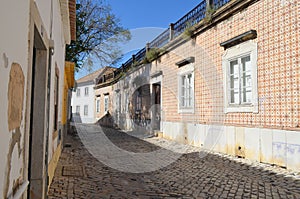 Cobbled streets in Faro city historical center, Algarve, Southern Portugal