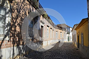 Cobbled streets in Faro city historical center, Algarve, Southern Portugal