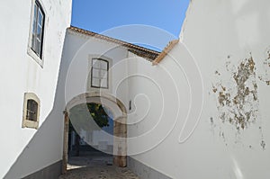 Cobbled streets in Faro city historical center, Algarve, Southern Portugal