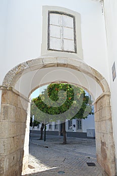 Cobbled streets in Faro city historical center, Algarve, Southern Portugal