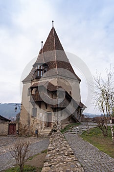 Cobblers` tower, one of the symbols of Sighisoara, on an overcast day