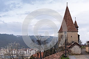 Cobblers` tower, one of the symbols of Sighisoara, on an overcast day in spring