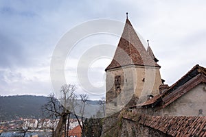 Cobblers` tower, one of the symbols of Sighisoara, on an overcast day in spring. Horizontal framing II