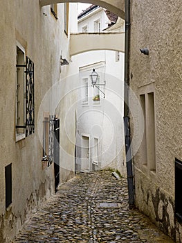 Alleyway and White Wall, Krems, Austria photo