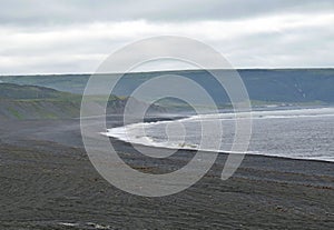 Cobblestone beach near St Vincent`s, NL Canada photo