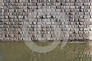 Cobblestone construction in river water