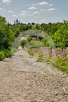 Cobblestone medieval road in Kamianets-Podilskyi Old Town, Ukraine