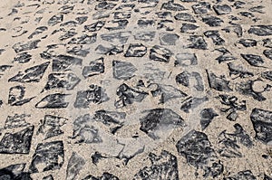 Cobblestone pattern on a summer day