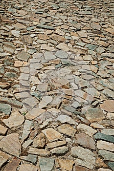 Cobblestone pavement forming a singular background