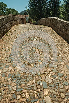Cobblestone pavement over an old Roman bridge in Portagem