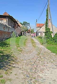 Cobblestone road on the old street. Zheleznodorozhny, Kaliningrad region