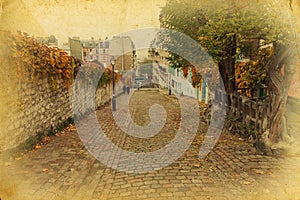 Cobblestone road in Paris in vintage style