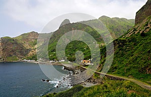 Cobblestone road traverses the bay of Fajan D'Agua