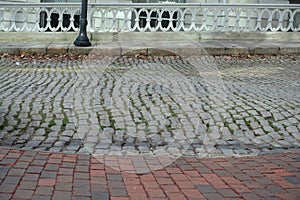 Cobblestone street and brick sidewalk in Portland, Maine, USA, Custom House Street