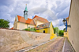 Cobblestone street near Capuchin monastery, Hradcany, Prague, Czech Republic