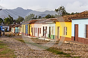 Cobblestone street with old colonial houses in the center of Trinidad, Cuba