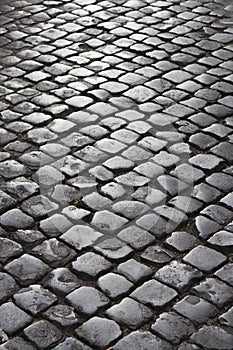 Cobblestone street in Rome, Italy.