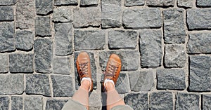 Cobblestone street travel man shoes selfie foot walking pavement stone pathway. Cobblestone path journey concept travel