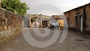 Cobblestone village street leading to the gate of the Casa de Marrocos, Idanha-a-Velha, Portugal