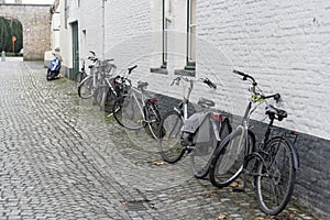 Cobblestoned alley and bicycles Bruges