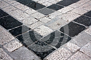 Cobblestoned granite floor background photo