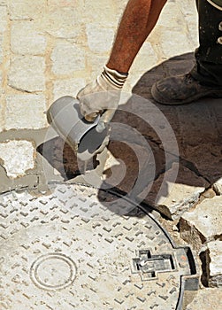 Cobblestones paved street in the traditional way