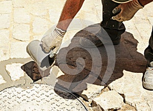 Cobblestones paved street in the traditional way