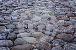 Cobblestones with perspective. Design and architecture of the city. Background. Space for text