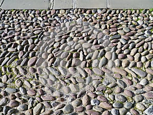 Coble stones in the streets of a town in Italy