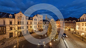 Elevated view of Albertsplatz with Christmas tree at night