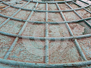 Cobweb pattern on the metal hatch.