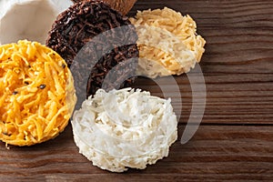 Cocada Coconut Candy on Rustic Wood Background