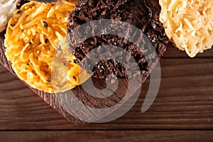 Cocada Coconut Candy on Rustic Wood Background