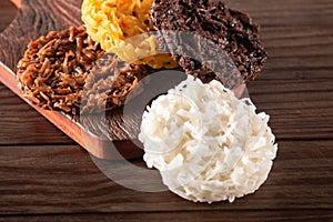 Cocada Coconut Candy on Rustic Wood Background