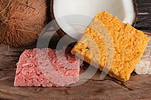 Cocada coconut candy, sweet Brazilian in rustic wood background