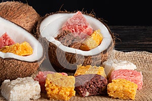 Cocada coconut candy, sweet Brazilian in rustic wood background