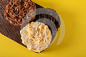 Cocada Coconut Candy on Yellow Background top view