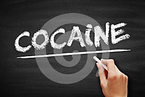 Cocaine is a stimulant drug obtained from the leaves of two coca species, text concept on blackboard