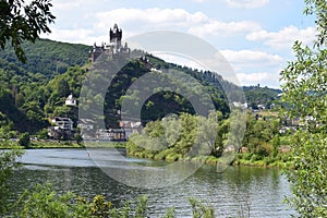 Cochem, Germany - 07 13 2020: view from Sehl to Cochem with the Reichsburg above the chapel