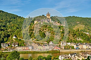 Cochem town in Germany on Moselle river with Reichsburg castle photo