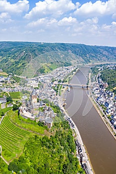 Cochem town at Moselle river Mosel with Middle Ages castle portrait format in Germany