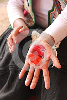 Cochineal red dye on a hand