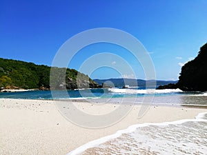 Cocinas Island white sand paradisiacal beach photo
