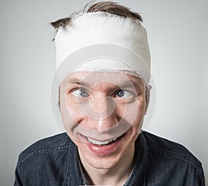 Man with bandage on his head photo