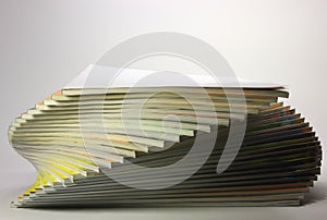 Cockling pile of magazines