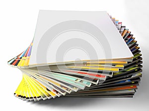 Cockling pile of magazines