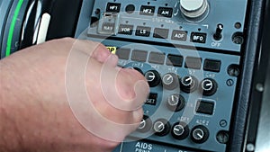 Cockpit cabin. Pilot switch controls aircraft a320